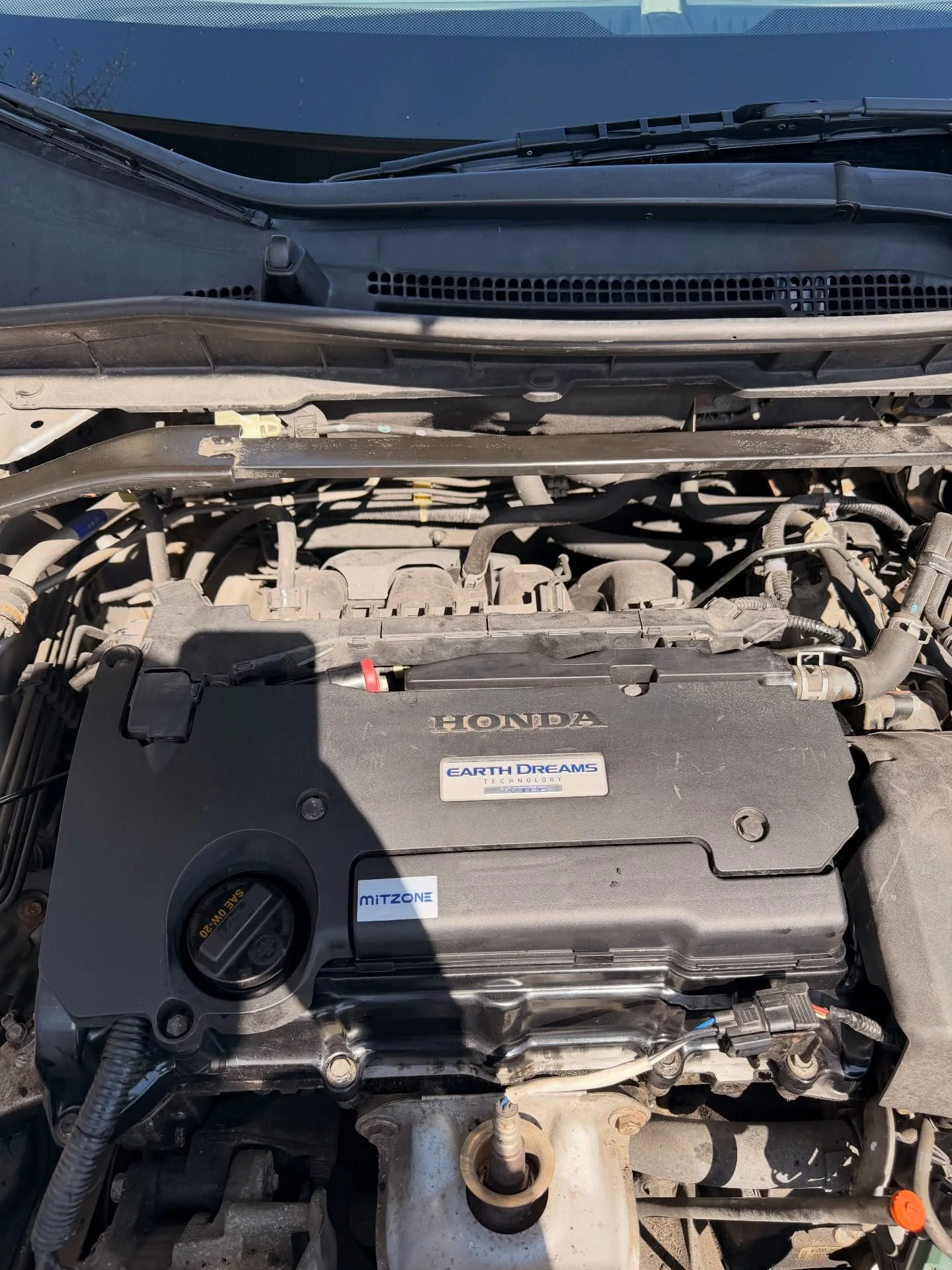 Honda Accord engine reassembled after valve-cover gasket repair